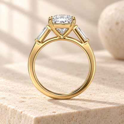 Aster Cushion Tapered Baguette Ring, side design preview in yellow gold on cream stone