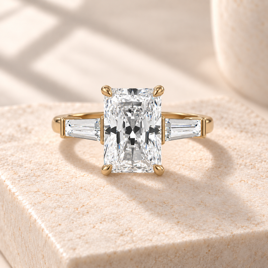 Aster Elongated Radiant Tapered Baguette Ring, front design preview in yellow gold on cream stone