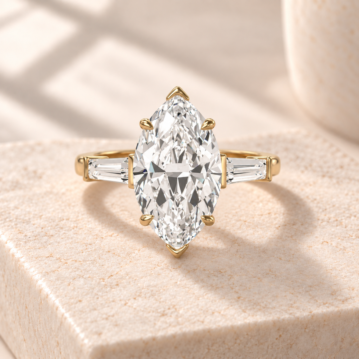 Aster marquise lab-grown diamond ring with tapered baguette sides in yellow gold, front design preview