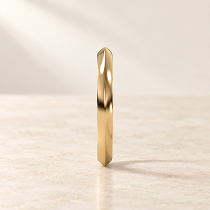 AI product preview of one Astra Knife-Edge Hoop Earring in yellow gold, front view of the knife edge