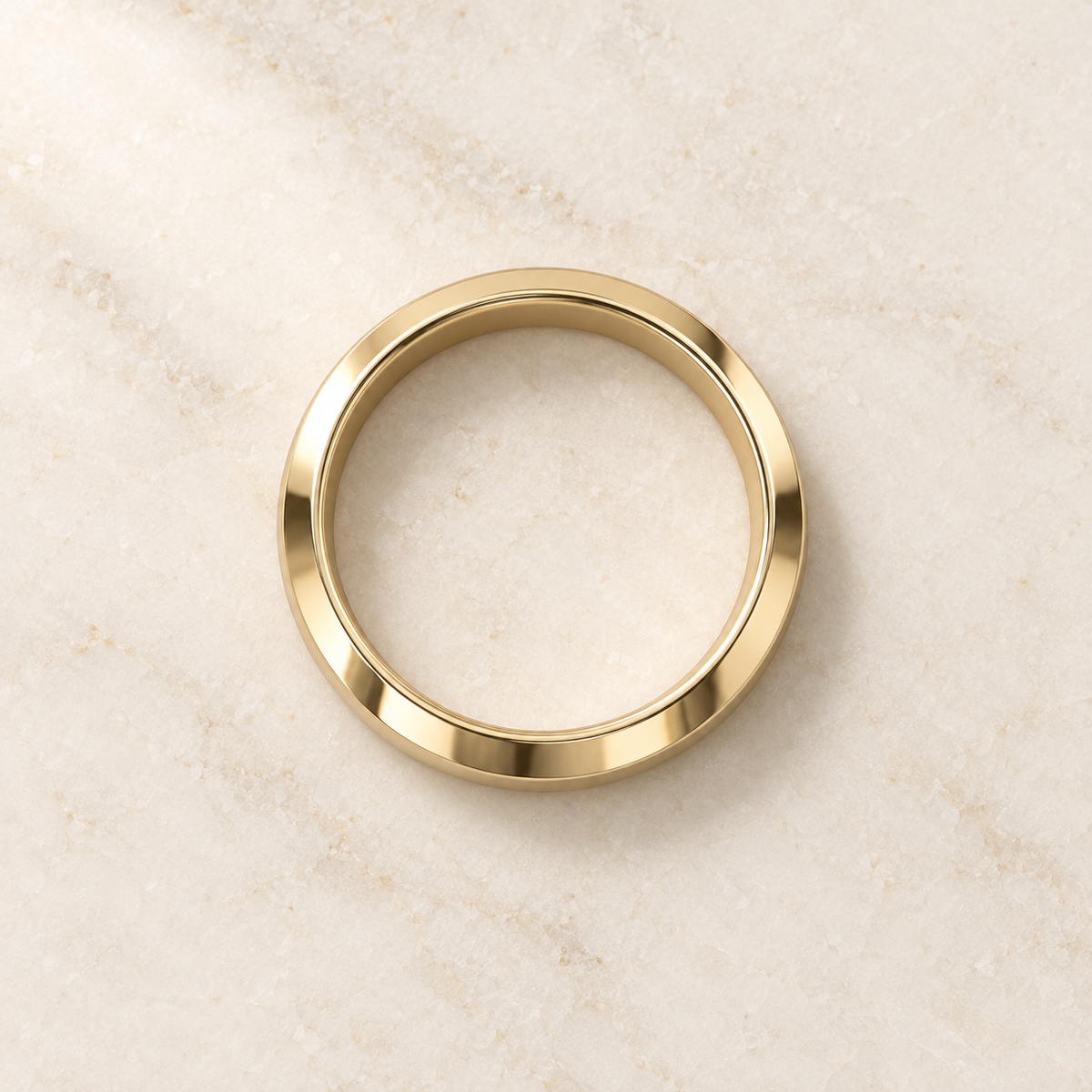 AI product preview of Astra Wide Knife-Edge Wedding Band in yellow gold, overhead view