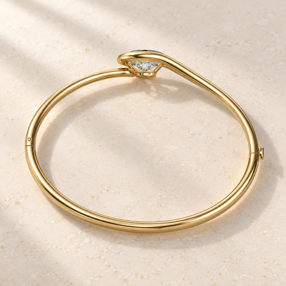 AI product preview of Embrace East-West Oval Diamond Bangle in yellow gold, elevated rear view