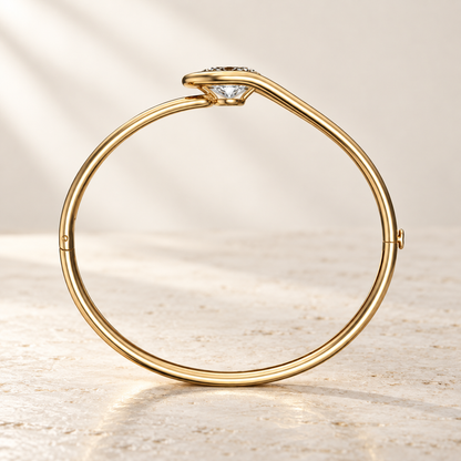 AI product preview of Embrace East-West Oval Diamond Bangle in yellow gold, structural side profile