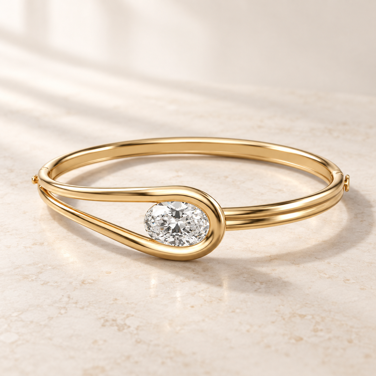 AI product preview of Embrace East-West Oval Diamond Bangle in yellow gold, elevated front view
