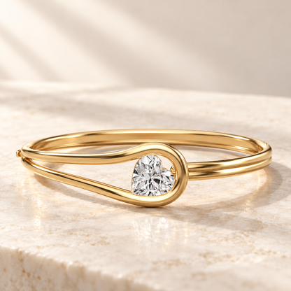 AI product preview of Embrace Heart Diamond Bangle in yellow gold, front view