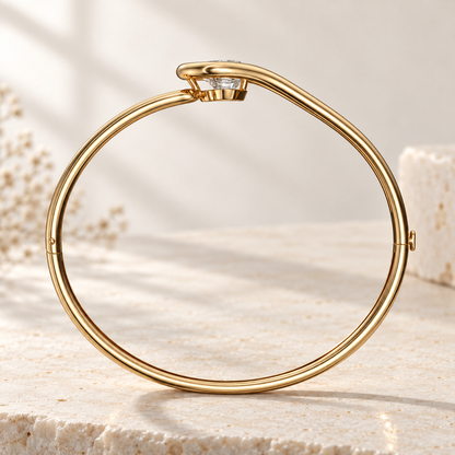 AI product preview of Embrace Heart Diamond Bangle in yellow gold, structural side profile