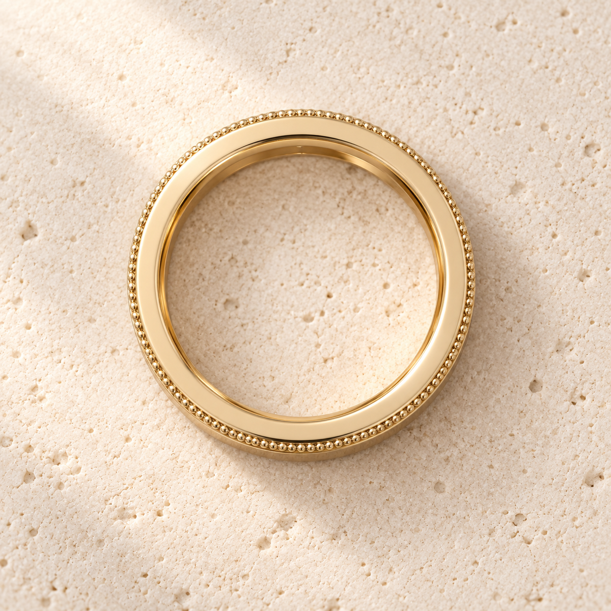 AI product preview of Heirloom Milgrain Wedding Band — 4 mm in yellow gold, overhead view