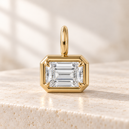 AI design preview — Sculpt East-West Emerald Diamond Pendant, front view