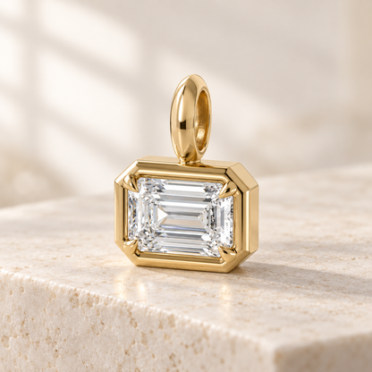 AI design preview — Sculpt East-West Emerald Diamond Pendant, three-quarter view