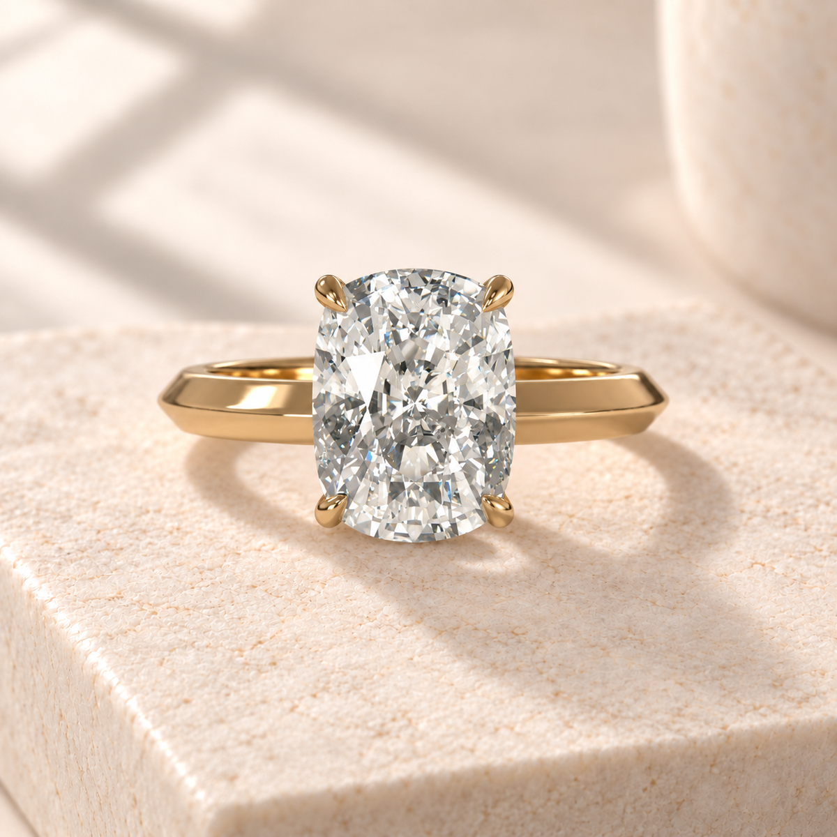 Veyra elongated cushion lab-grown diamond solitaire with a knife-edge yellow gold band, front design preview