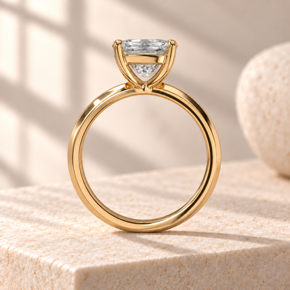 Veyra elongated radiant lab-grown diamond solitaire with a knife-edge yellow gold band, side design preview