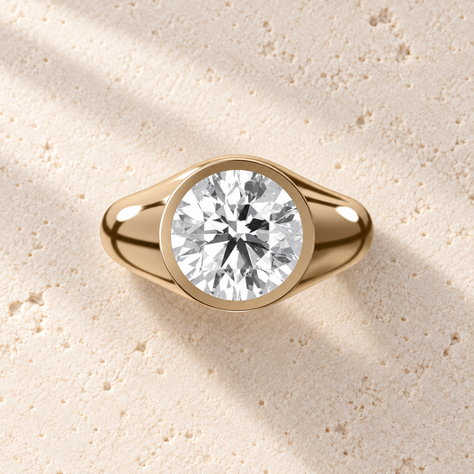 Sculpt Round Bezel Signet Ring in yellow gold, top view — AI design preview