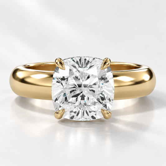 Solara Cushion Domed Solitaire Ring in yellow gold, straight-on front view — AI design preview