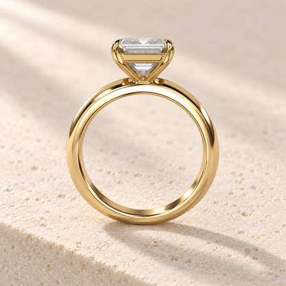 Solara Emerald Domed Solitaire Ring in yellow gold, side view — AI design preview