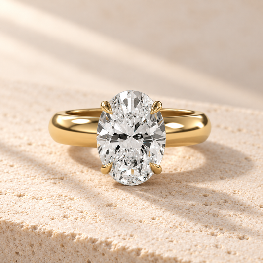Solara Oval Domed Solitaire Ring in yellow gold, front view — AI design preview