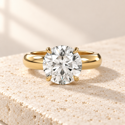 Solara Round Domed Solitaire Ring in yellow gold, front view — AI design preview